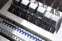 a-bunch-of-wires-are-plugged-into-a-switch-box.jpg a bunch of wires are plugged into a switch box